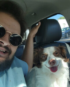 Image of Wesley Hall and his dog, Cinco.