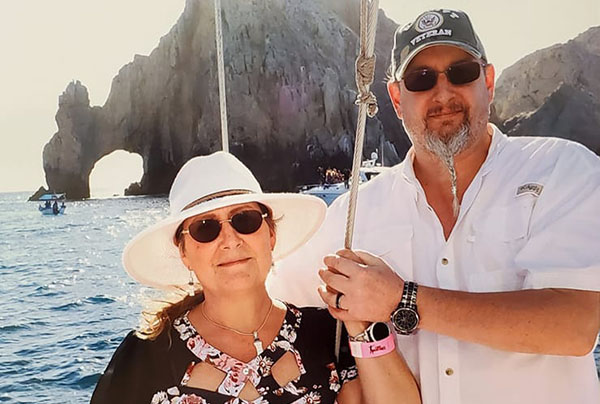 Paladin Task Specialist Eric Nelson and his wife Deanna near the Arch at Land's End, Cabo San Lucas, Mexico